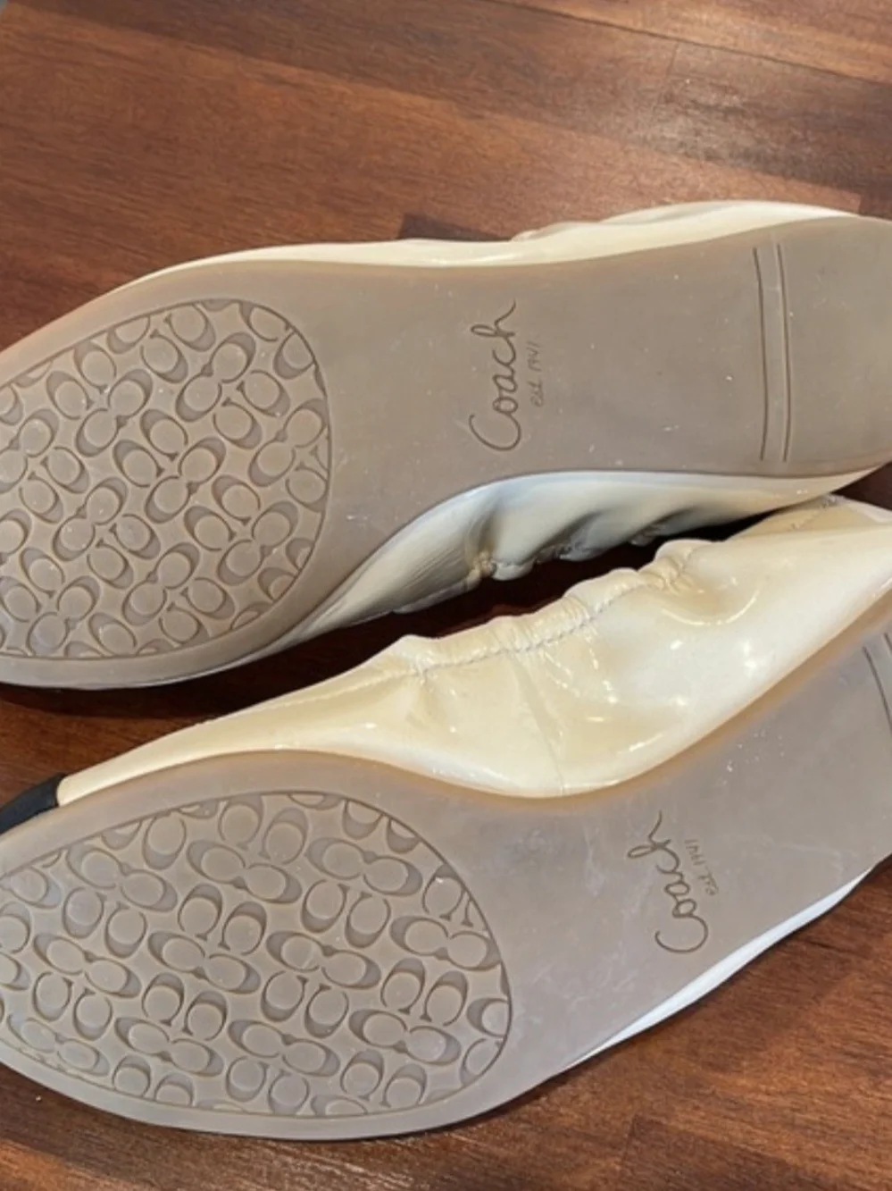 Coach Two-Tone Patent Bow Cap-Toe Ballet Flats in Beige and Black